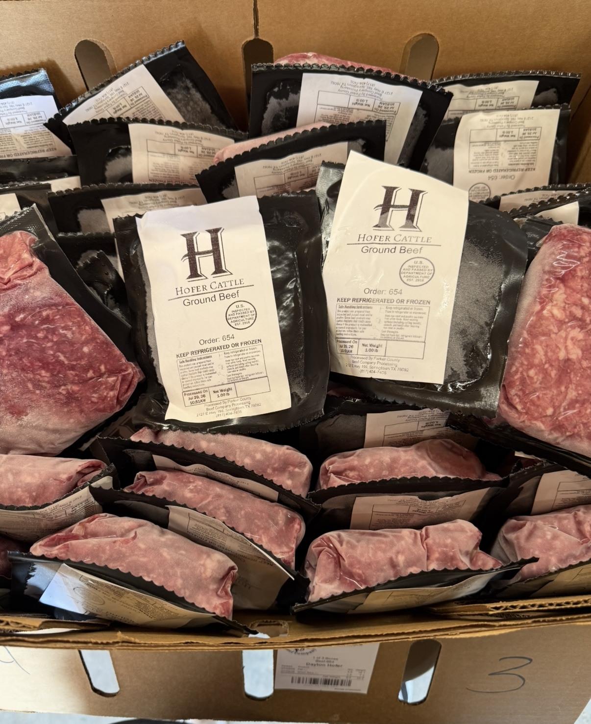 A box of Hofer Cattle Co. packaged ground beef